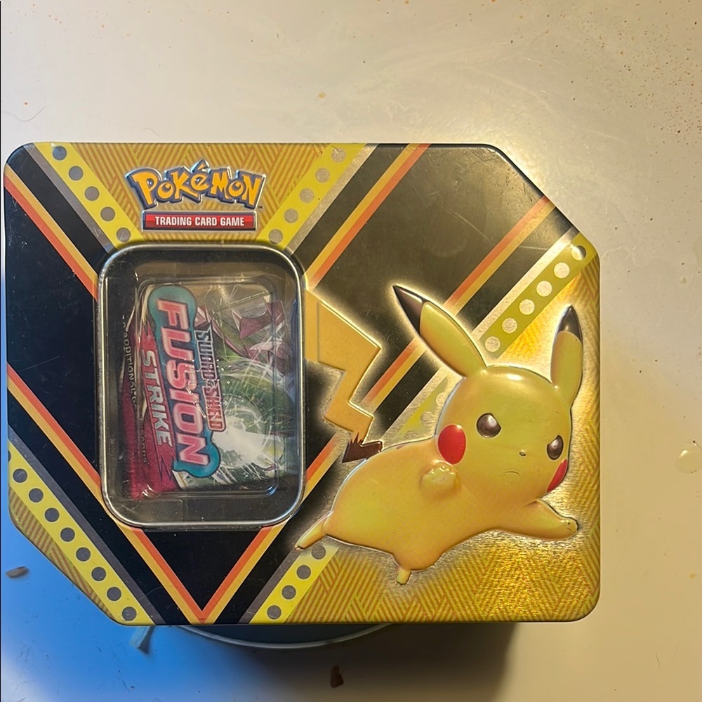 Pokemon Tin with Pikachu and Fusion Strike Packs
